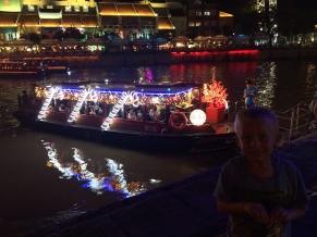 Logan liked the decorated boats at Clarke Quay